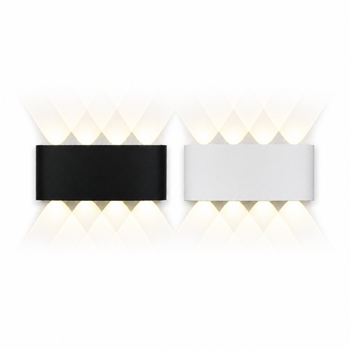 Black and white exterior wall light with warm criss-cross beam