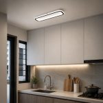 Modern slim rectangle ceiling light installed on a smooth white ceiling inside a contemporary Singapore HDB flat kitchen.