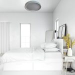 round living room light installed in modern white bedroom