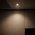 Halo downlight creating a soft anti-glare glow on a false ceiling