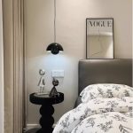 japandi scandi pendant light in black at beside bed