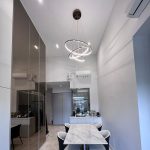 Actual installation of UFO 3 rings rose gold modern hanging light fixtures in a dining room