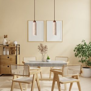 Modern pendant lamp with stone texture above dining table in minimalist interior