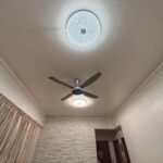 Two Crystaline 50cm round crystal LED ceiling lights installed in a Singapore condo living room
