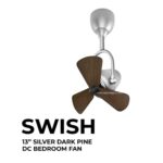 Alaska Swish Corner Fan in silver finish with dark pine wood-textured blades.