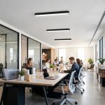 Black Rectangular ceiling lamp installed in modern office ceiling