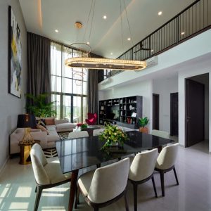 rectangular crystal pendant light above landed house dining table