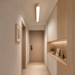 Scandinavian wood ceiling light in a Singapore apartment hallway