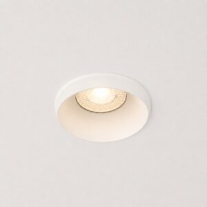 Small round fixed recessed downlight in singapore home lit on false ceiling with warm anti-glare glow