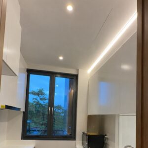 Arclux-Axis slim coveless cove light installed in condo kitchen
