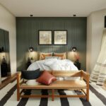 Modern glass ball pendant lights hanging beside a bedroom bed